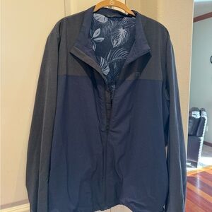 Travis Mathew- Men’s Lightweight Navy and Gray Jacket with Leaf Print Lining